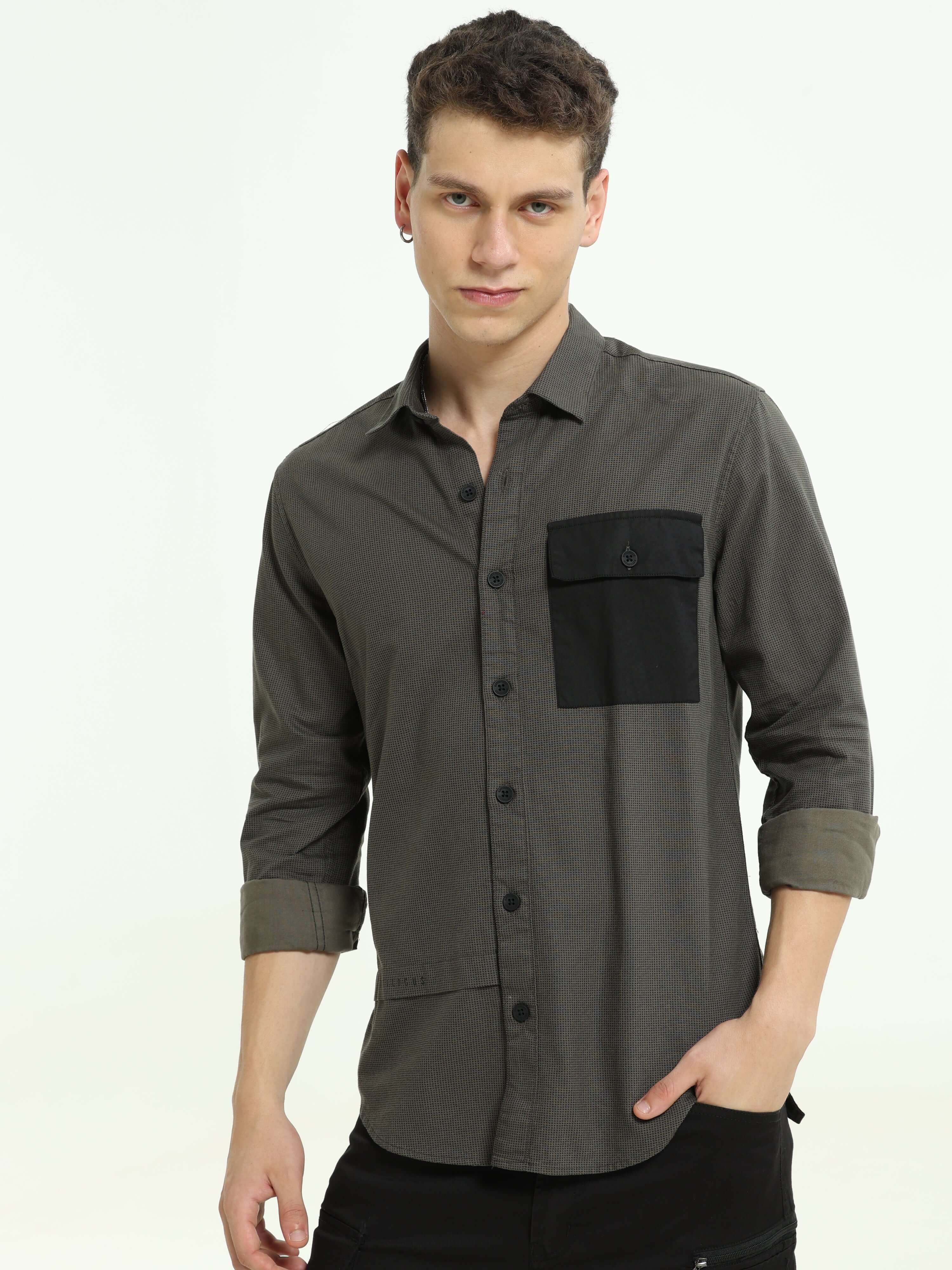 Charcoal contrast patch solid shirt shop online at Estilocus. • Full-sleeve check shirt• Cut and sew placket• Regular collar• Double button square cuff.• Single pocket • Curved hemline• All double-needle construction, finest quality sewing• Machine wash c