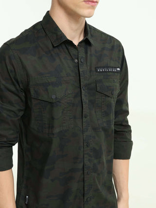 ETLS/72 Camo Cargo navy green shirt shop online at Estilocus. 100% Cotton • Full-sleeve cameo print shirt• Cut and sew placket• Regular collar• Double button edge cuff • Double pocket with flap • Curved bottom hemline . • All double needle construction, f