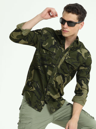 ETLS/72 Camo Cargo military green shirt shop online at Estilocus. 100% Cotton • Full-sleeve camo print shirt• Cut and sew placket• Regular collar• Double button edge cuff • Double pocket with flap • Curved bottom hemline . • All double needle construction