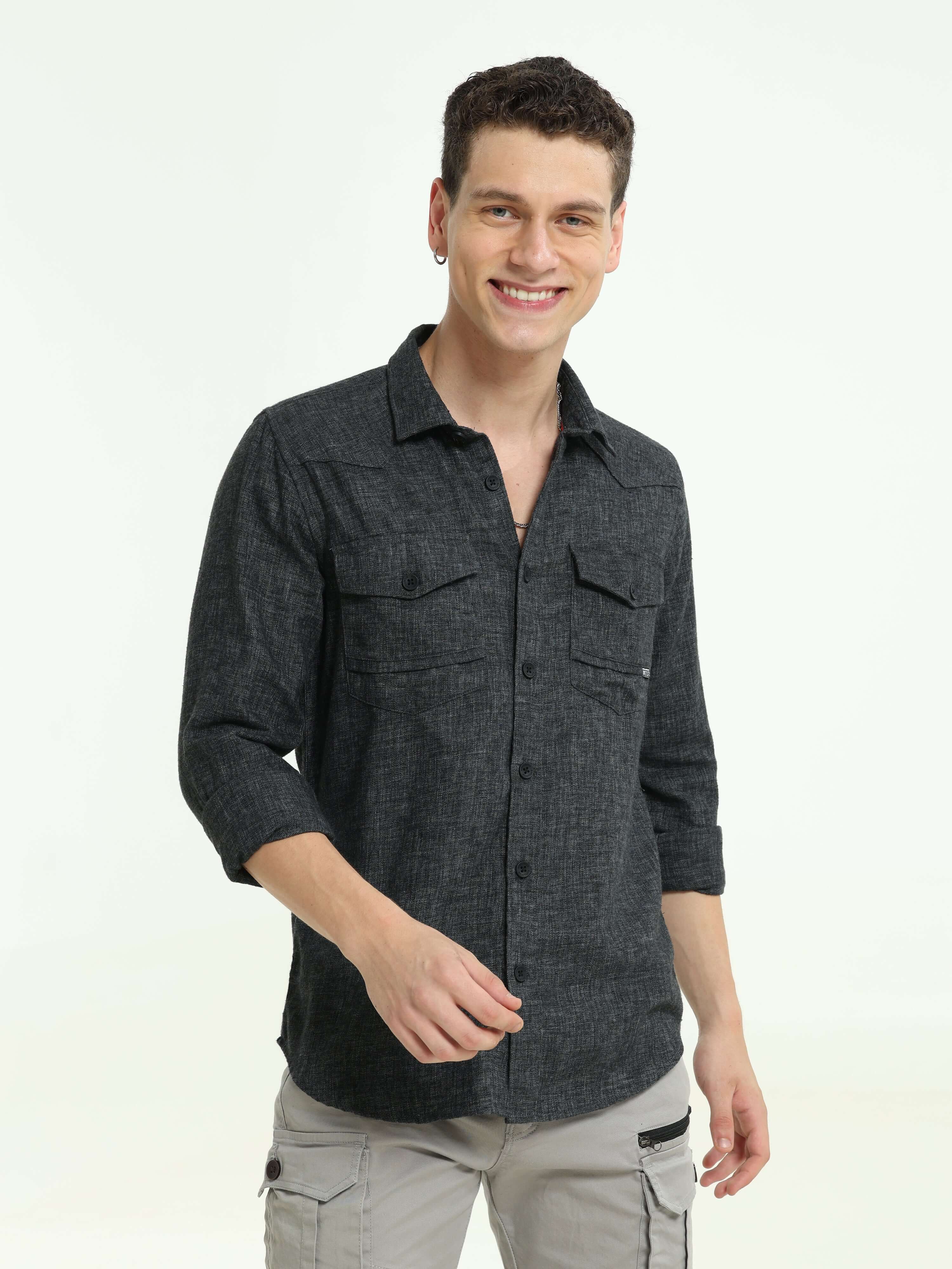 Charcoal grey solid double pocket shirt shop online at Estilocus. 100% Cotton • Full-sleeve solid shirt• Cut and sew placket• Regular collar• Double button edge cuff • Double pocket with flap • Curved bottom hemline . • All double needle construction, fin