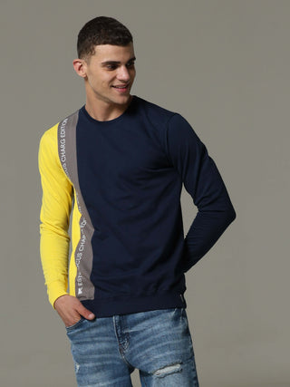 Charg Colorblock Blue Sweat Shirt shop online at Estilocus. • Crew neck• Long sleeve• Ribbing around neckline, Cuff & hem• Contrasting patch work. Fit : Comfort fit Size : The model is wearing M size Model height : 6 Feet Wash care : Cold machine wash