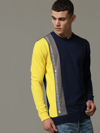 Charg Colorblock Blue Sweat Shirt shop online at Estilocus. • Crew neck• Long sleeve• Ribbing around neckline, Cuff & hem• Contrasting patch work. Fit : Comfort fit Size : The model is wearing M size Model height : 6 Feet Wash care : Cold machine wash