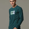 Charg Teal Sweat Shirt shop online at Estilocus. • Crew neck • Long sleeve • Ribbing around neckline, Cuff & hem • High quality print and fine embroidery Fit : Comfort fit Size : The model is wearing M size Model height : 6 Feet Wash care : Cold machine w
