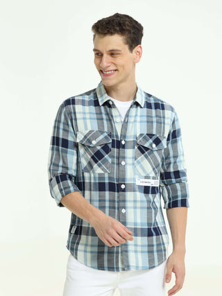 Indigo check double pocket shirt shop online at Estilocus. 100% Cotton • Full-sleeve check shirt• Cut and sew placket• Regular collar• Double button edge cuff• Double pocket with flap• Curved bottom hemline .• All double needle construction, finest qualit