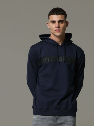 Navy Charg Hoodie shop online at Estilocus. • Crew neck with an attached hood • Adjustable hood with drawcord •A regular fit with long sleeves •Zipper and pocketless • Dress it up with a pair of Denim or Joggers Fit : Comfort fit Size : The model is weari