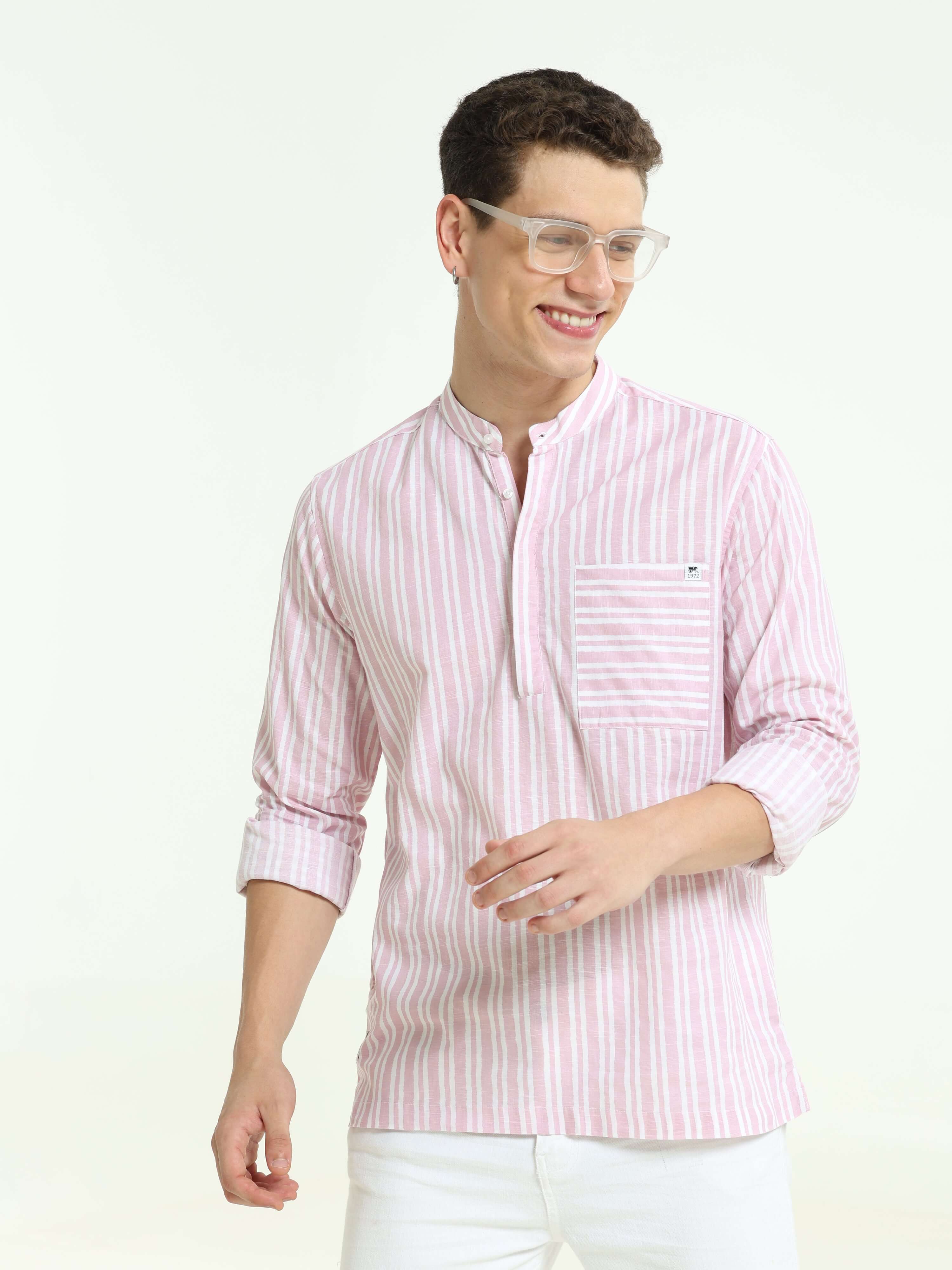 Throne pastel pink casual kurta shop online at Estilocus. • Five-sleeve stripe kurta• Mandarin collar• Double button square cuff.• Single pocket with logo embroidery• Curved hemline• All double-needle construction, finest quality sewing• Machine wash care