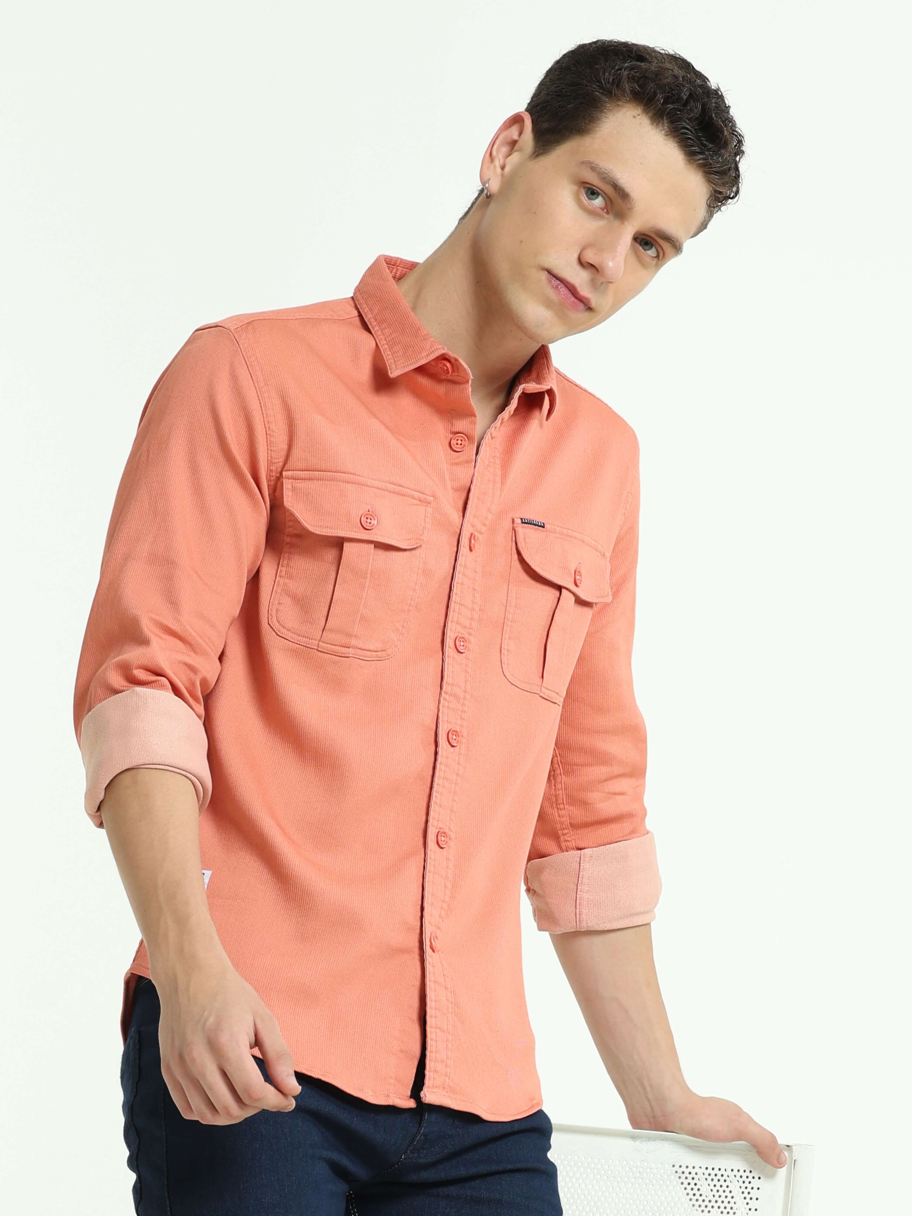 Salmon solid double pocket shirt shop online at Estilocus. 100% Cotton • Full-sleeve solid shirt• Cut and sew placket• Regular collar• Double button edge cuff • Double pocket with flap • Curved bottom hemline . • All double needle construction, finest qua