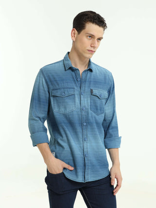 Indigo colored Stripe double pocket shirt shop online at Estilocus. 100% Cotton • Full-sleeve denim shirt• Cut and sew placket• Regular collar• Double button edge cuff • Double pocket with flap • Curved bottom hemline . • All double needle construction, f