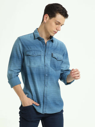 Indigo colored Stripe double pocket shirt shop online at Estilocus. 100% Cotton • Full-sleeve denim shirt• Cut and sew placket• Regular collar• Double button edge cuff • Double pocket with flap • Curved bottom hemline . • All double needle construction, f