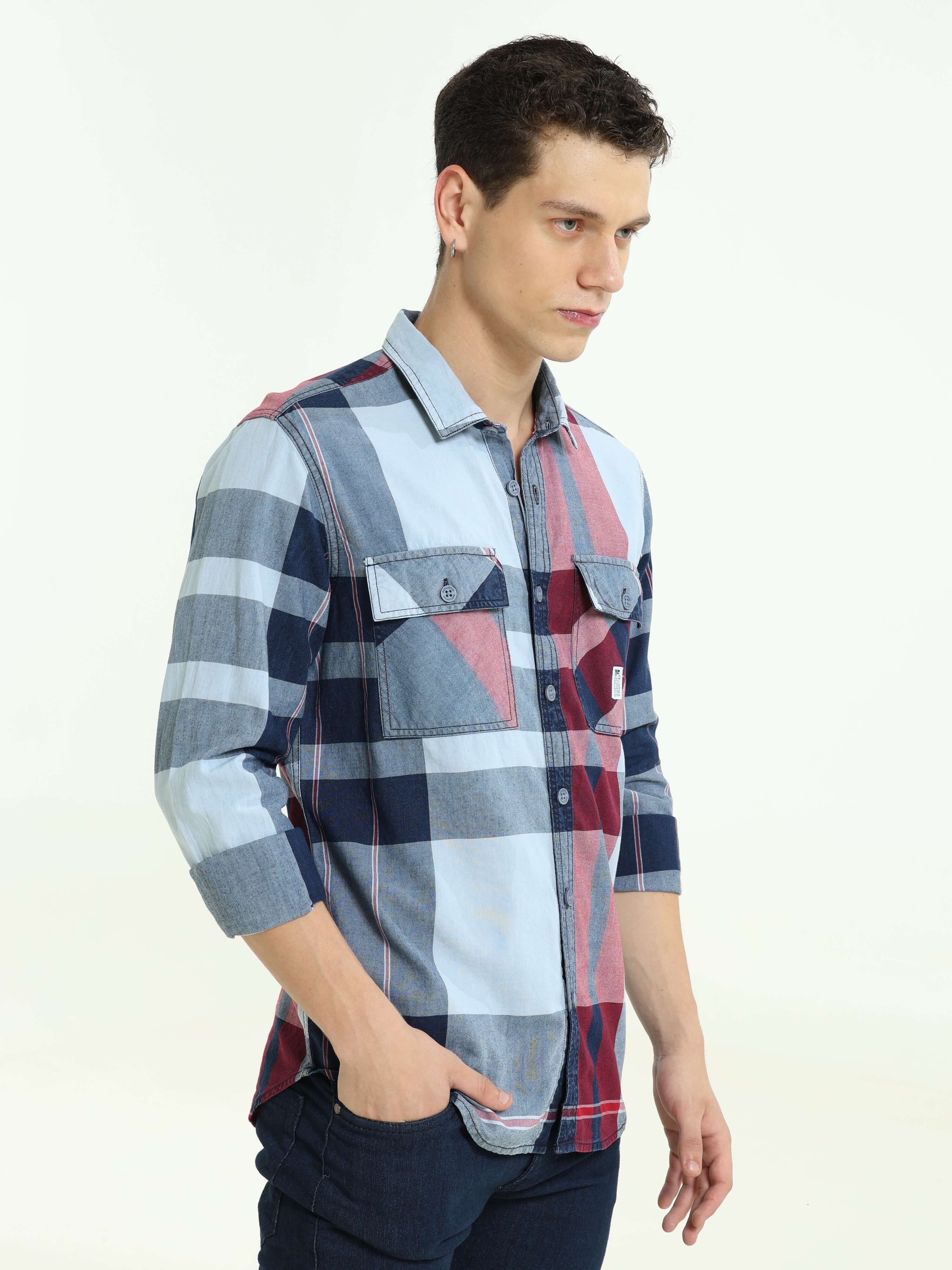 Indigo big check double pocket shirt shop online at Estilocus. 100% Cotton • Full-sleeve check shirt• Cut and sew placket• Regular collar• Double button edge cuff • Double pocket with flap • Curved bottom hemline . • All double needle construction, finest