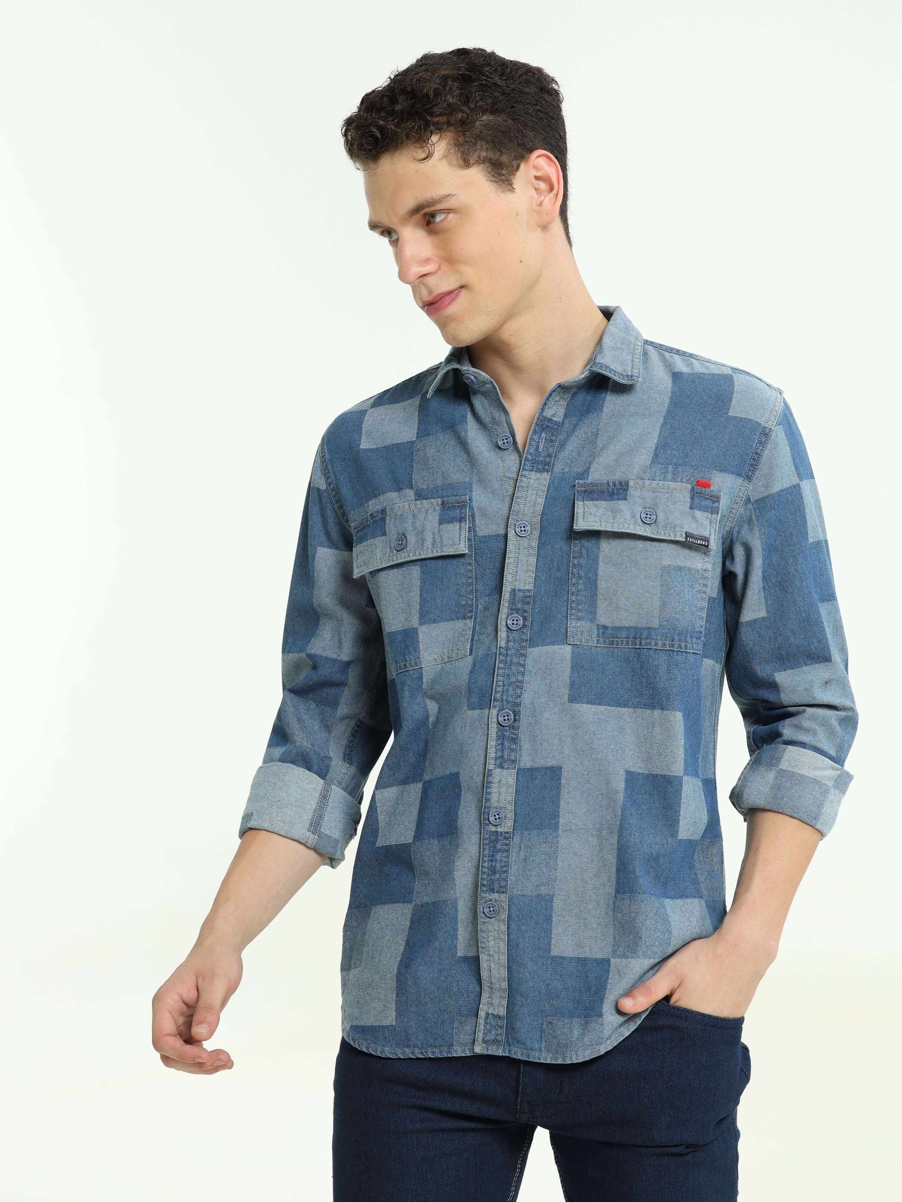 LS Denim multi blocked check shirt shop online at Estilocus. 100% Cotton • Full-sleeve check shirt• Cut and sew placket• Regular collar• Double button edge cuff • Double pocket with flap • Curved bottom hemline . • All double needle construction, finest q