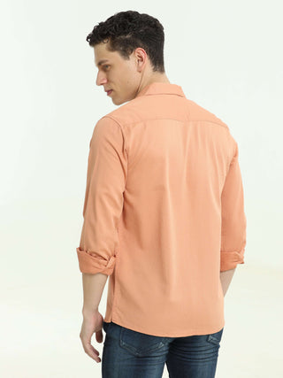 Orange solid cuben colloar shirt shop online at Estilocus. • 100% Cotton , Full-sleeve solid shirt• Cuban collar• Double button edge cuff • Pocketess • Curved bottom hemline . • All double needle construction, finest quality sewing• Machine wash care• Sui