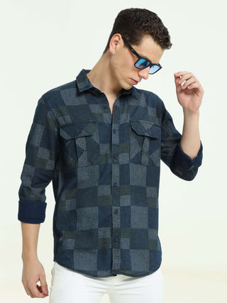 Denim multi blocked check casual shirt shop online at Estilocus. 100% Cotton • Full-sleeve check shirt• Cut and sew placket• Regular collar• Double button edge cuff • Double pocket with flap • Curved bottom hemline . • All double needle construction, fine