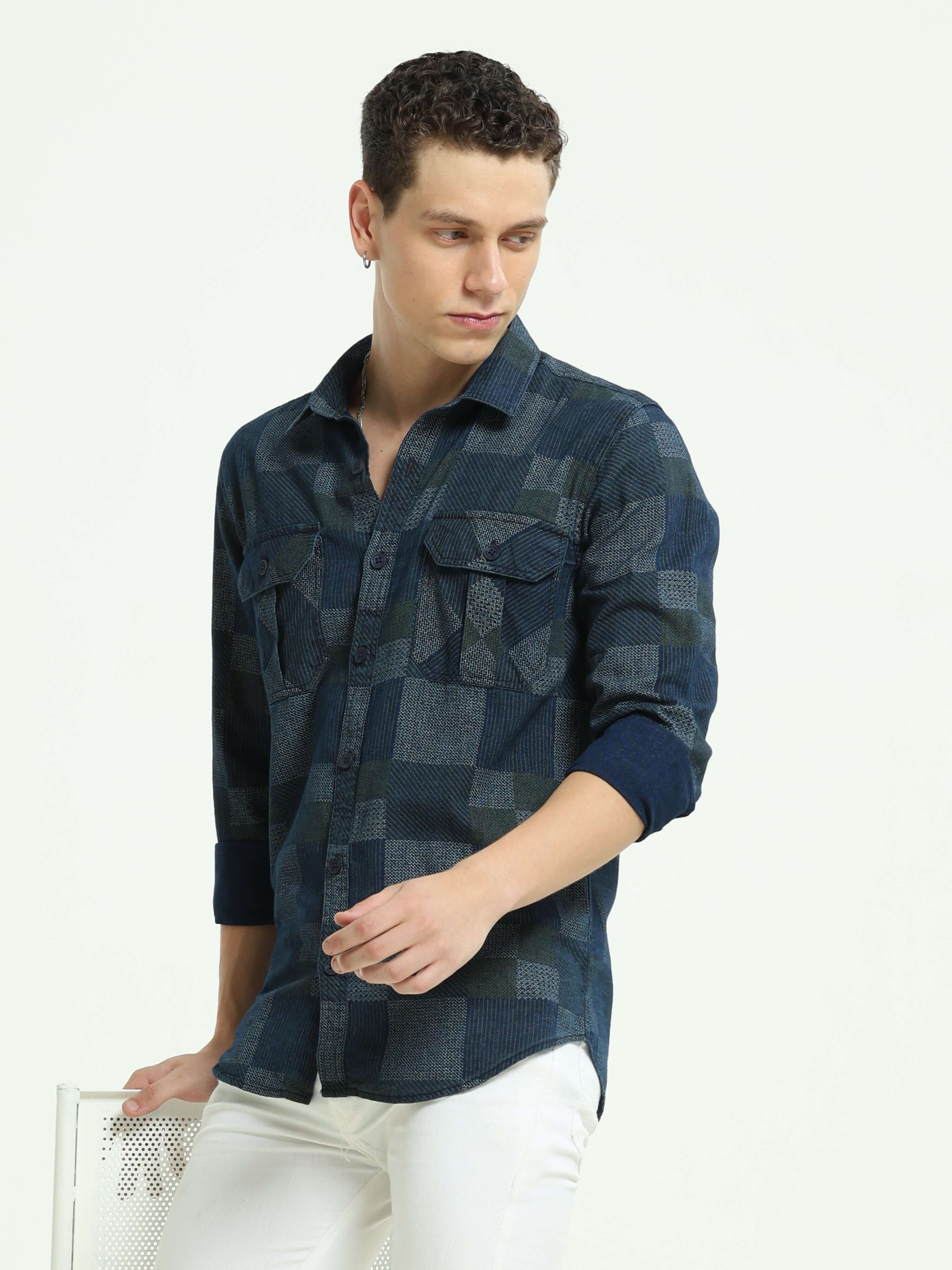 Denim multi blocked check casual shirt shop online at Estilocus. 100% Cotton • Full-sleeve check shirt• Cut and sew placket• Regular collar• Double button edge cuff • Double pocket with flap • Curved bottom hemline . • All double needle construction, fine