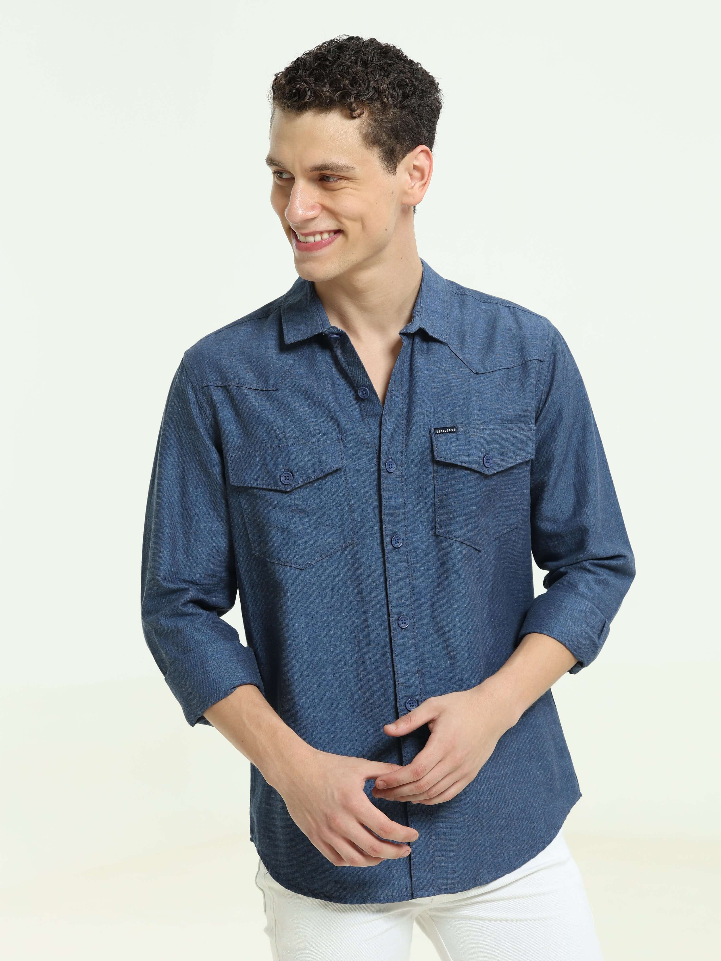 Indigo blue solid double pocket shirt shop online at Estilocus. • 100% Cotton , Full-sleeve solid shirt• Cut and sew placket• Regular collar• Double button edge cuff• Double pocket with flap• Curved bottom hemline .• All double needle construction, finest