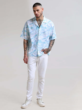 Marble Wave Oversized Shirt shop online at Estilocus. Our Marble Wave Oversized Shirt is perfect for those Hawaiian days. The relaxed fit and lightweight fabric make it comfortable to wear all day. Its classic style is perfect for those summer streetwear