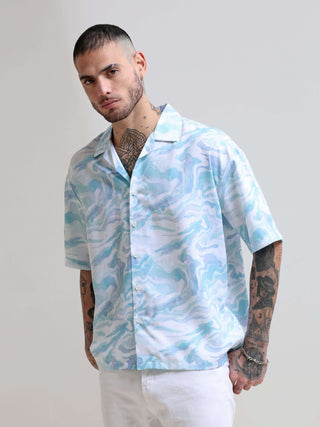 Marble Wave Oversized Shirt shop online at Estilocus. Our Marble Wave Oversized Shirt is perfect for those Hawaiian days. The relaxed fit and lightweight fabric make it comfortable to wear all day. Its classic style is perfect for those summer streetwear