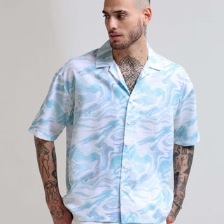 Marble Wave Oversized Shirt shop online at Estilocus. Our Marble Wave Oversized Shirt is perfect for those Hawaiian days. The relaxed fit and lightweight fabric make it comfortable to wear all day. Its classic style is perfect for those summer streetwear