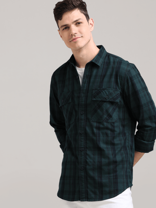 Dusky Green Semi Corduroy Shirt shop online at Estilocus. 100% Cotton • Full-sleeve check shirt• Cut and sew placket• Regular collar• Double button edge cuff• Double pocket with flap• Curved bottom hemline .• All double needle construction, finest quality