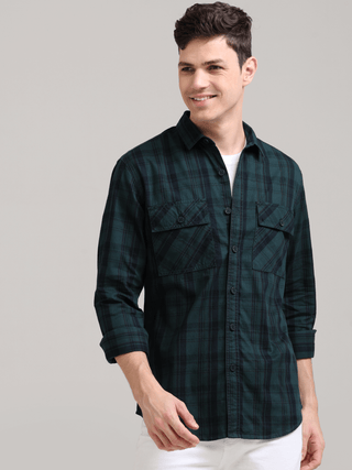 Dusky Green Semi Corduroy Shirt shop online at Estilocus. 100% Cotton • Full-sleeve check shirt• Cut and sew placket• Regular collar• Double button edge cuff• Double pocket with flap• Curved bottom hemline .• All double needle construction, finest quality