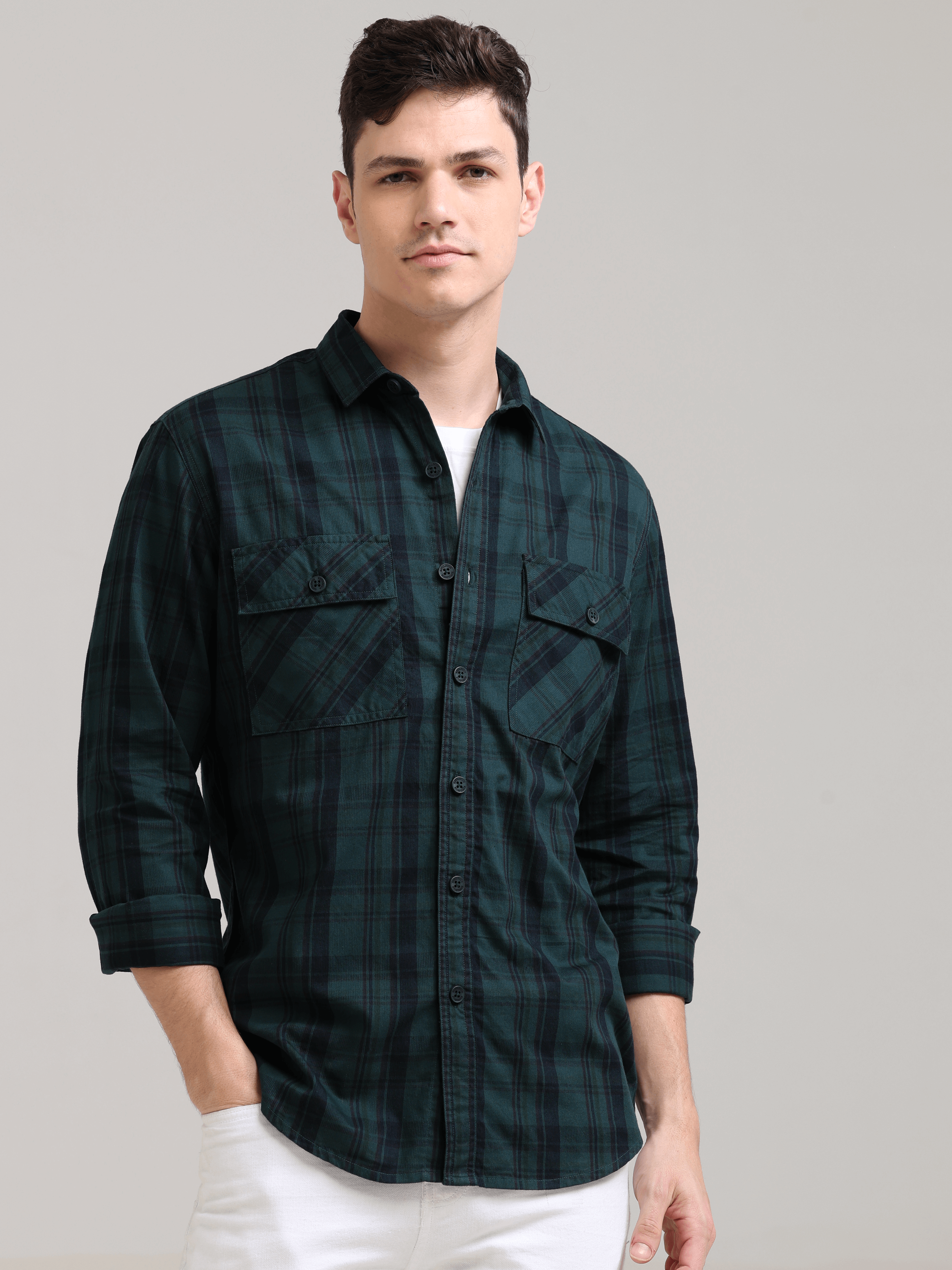 Dusky Green Semi Corduroy Shirt shop online at Estilocus. 100% Cotton • Full-sleeve check shirt• Cut and sew placket• Regular collar• Double button edge cuff• Double pocket with flap• Curved bottom hemline .• All double needle construction, finest quality