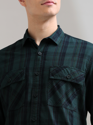 Dusky Green Semi Corduroy Shirt shop online at Estilocus. 100% Cotton • Full-sleeve check shirt• Cut and sew placket• Regular collar• Double button edge cuff• Double pocket with flap• Curved bottom hemline .• All double needle construction, finest quality