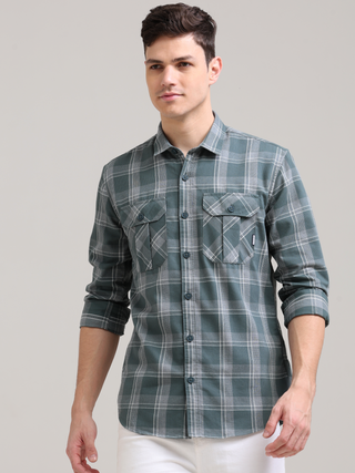 Caribbean Teal Grey Casual Check Shirt shop online at Estilocus. 100% Cotton • Full-sleeve check shirt• Cut and sew placket• Regular collar• Double button edge cuff• Double pocket with flap• Curved bottom hemline .• All double needle construction, finest