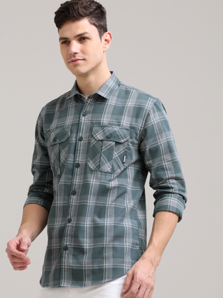 Caribbean Teal Grey Casual Check Shirt shop online at Estilocus. 100% Cotton • Full-sleeve check shirt• Cut and sew placket• Regular collar• Double button edge cuff• Double pocket with flap• Curved bottom hemline .• All double needle construction, finest