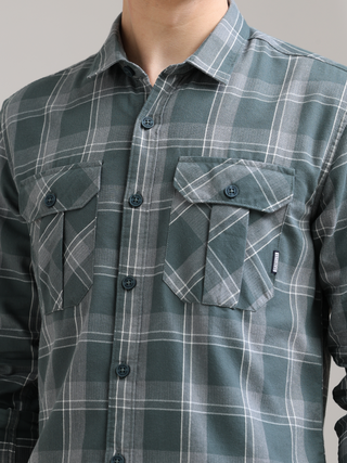 Caribbean Teal Grey Casual Check Shirt shop online at Estilocus. 100% Cotton • Full-sleeve check shirt• Cut and sew placket• Regular collar• Double button edge cuff• Double pocket with flap• Curved bottom hemline .• All double needle construction, finest