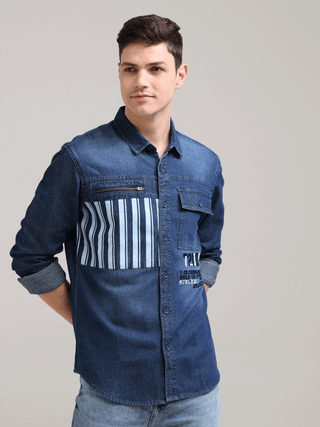 Denim Navy Double Pocket Shirt shop online at Estilocus. Denim ,Full-sleeve shirt Cut and sew placket. Regular collar Double button edge cuff Zipper hidden pocket, other end with flap pocket Curved bottom hemline HD elegant print at pocket All Double need