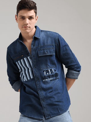 Denim Navy Double Pocket Shirt shop online at Estilocus. Denim ,Full-sleeve shirt Cut and sew placket. Regular collar Double button edge cuff Zipper hidden pocket, other end with flap pocket Curved bottom hemline HD elegant print at pocket All Double need