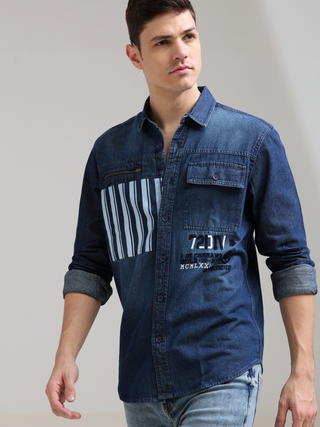 Denim Navy Double Pocket Shirt shop online at Estilocus. Denim ,Full-sleeve shirt Cut and sew placket. Regular collar Double button edge cuff Zipper hidden pocket, other end with flap pocket Curved bottom hemline HD elegant print at pocket All Double need