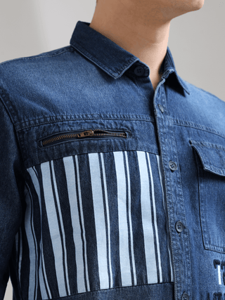 Denim Navy Double Pocket Shirt shop online at Estilocus. Denim ,Full-sleeve shirt Cut and sew placket. Regular collar Double button edge cuff Zipper hidden pocket, other end with flap pocket Curved bottom hemline HD elegant print at pocket All Double need