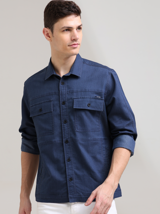 Prussian Blue Denim Shirt shop online at Estilocus. 100% premium Denim Full-sleeve shirt Cut and sew placket. Regular collar Double button edge cuff Double pocket, other end with flap pocket Curved bottom hemline HD elegant print at panal All Double needl