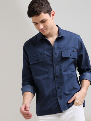 Prussian Blue Denim Shirt shop online at Estilocus. 100% premium Denim Full-sleeve shirt Cut and sew placket. Regular collar Double button edge cuff Double pocket, other end with flap pocket Curved bottom hemline HD elegant print at panal All Double needl