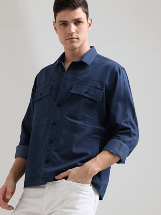 Prussian Blue Denim Shirt shop online at Estilocus. 100% premium Denim Full-sleeve shirt Cut and sew placket. Regular collar Double button edge cuff Double pocket, other end with flap pocket Curved bottom hemline HD elegant print at panal All Double needl