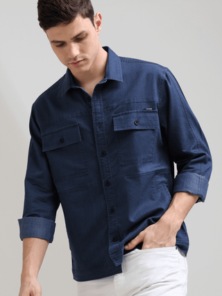 Prussian Blue Denim Shirt shop online at Estilocus. 100% premium Denim Full-sleeve shirt Cut and sew placket. Regular collar Double button edge cuff Double pocket, other end with flap pocket Curved bottom hemline HD elegant print at panal All Double needl