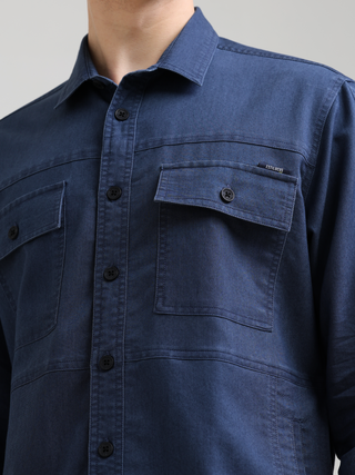 Prussian Blue Denim Shirt shop online at Estilocus. 100% premium Denim Full-sleeve shirt Cut and sew placket. Regular collar Double button edge cuff Double pocket, other end with flap pocket Curved bottom hemline HD elegant print at panal All Double needl