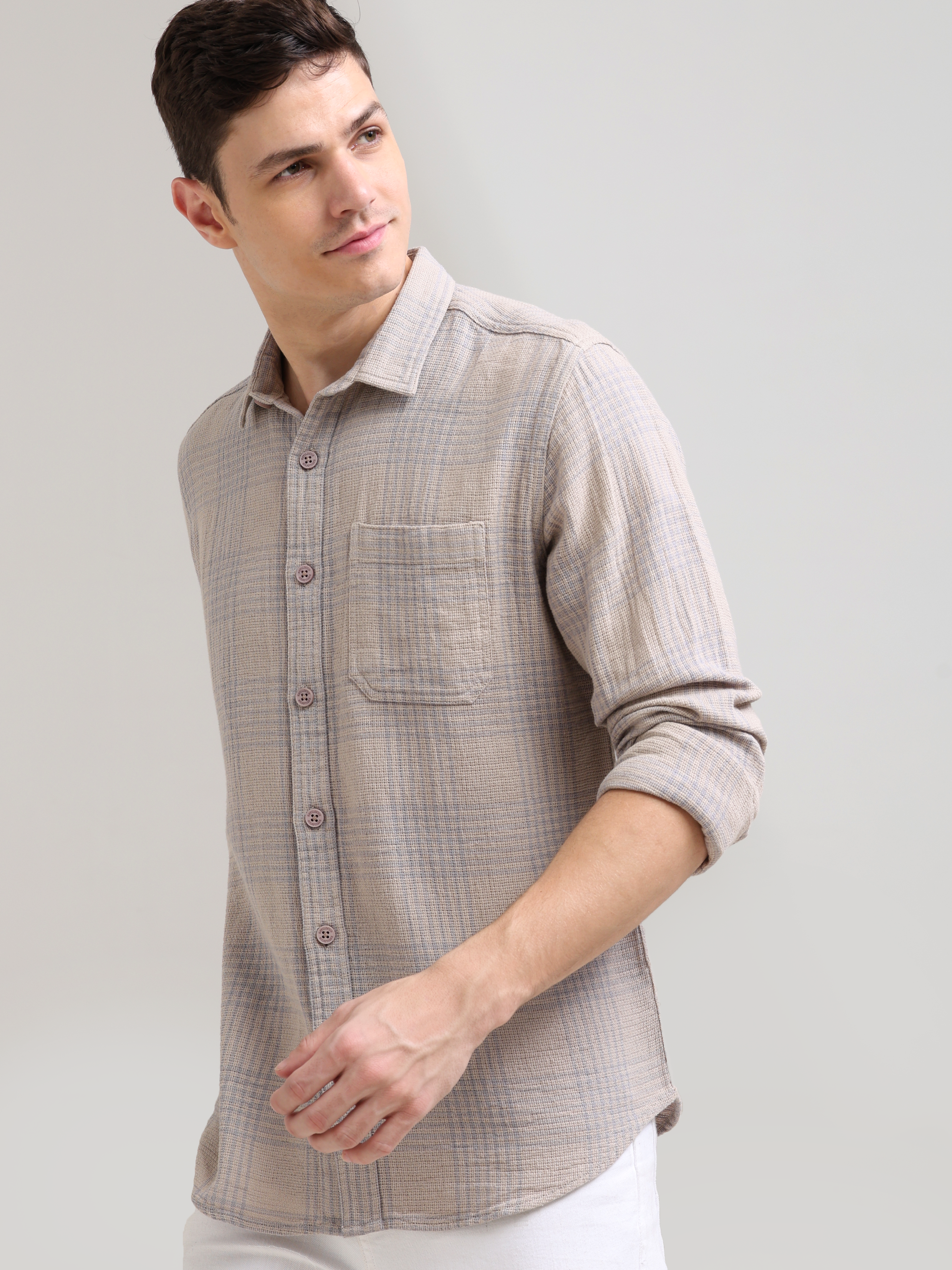 LT coffee off-cream casual check shirt shop online at Estilocus. 100% Cotton • Full-sleeve check shirt• Cut and sew placket• Regular collar• Double button edge cuff• Single pocket • Curved bottom hemline .• All double needle construction, finest quality s
