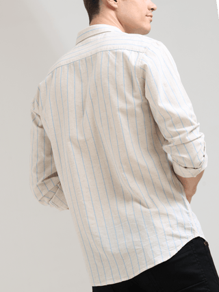 Pure Cotton Blue Stripes Casual Shirt shop online at Estilocus. 100% Cotton • Full-sleeve check shirt• Cut and sew placket• Regular collar• Double button edge cuff• Double pocket • Curved bottom hemline .• All double needle construction, finest quality se