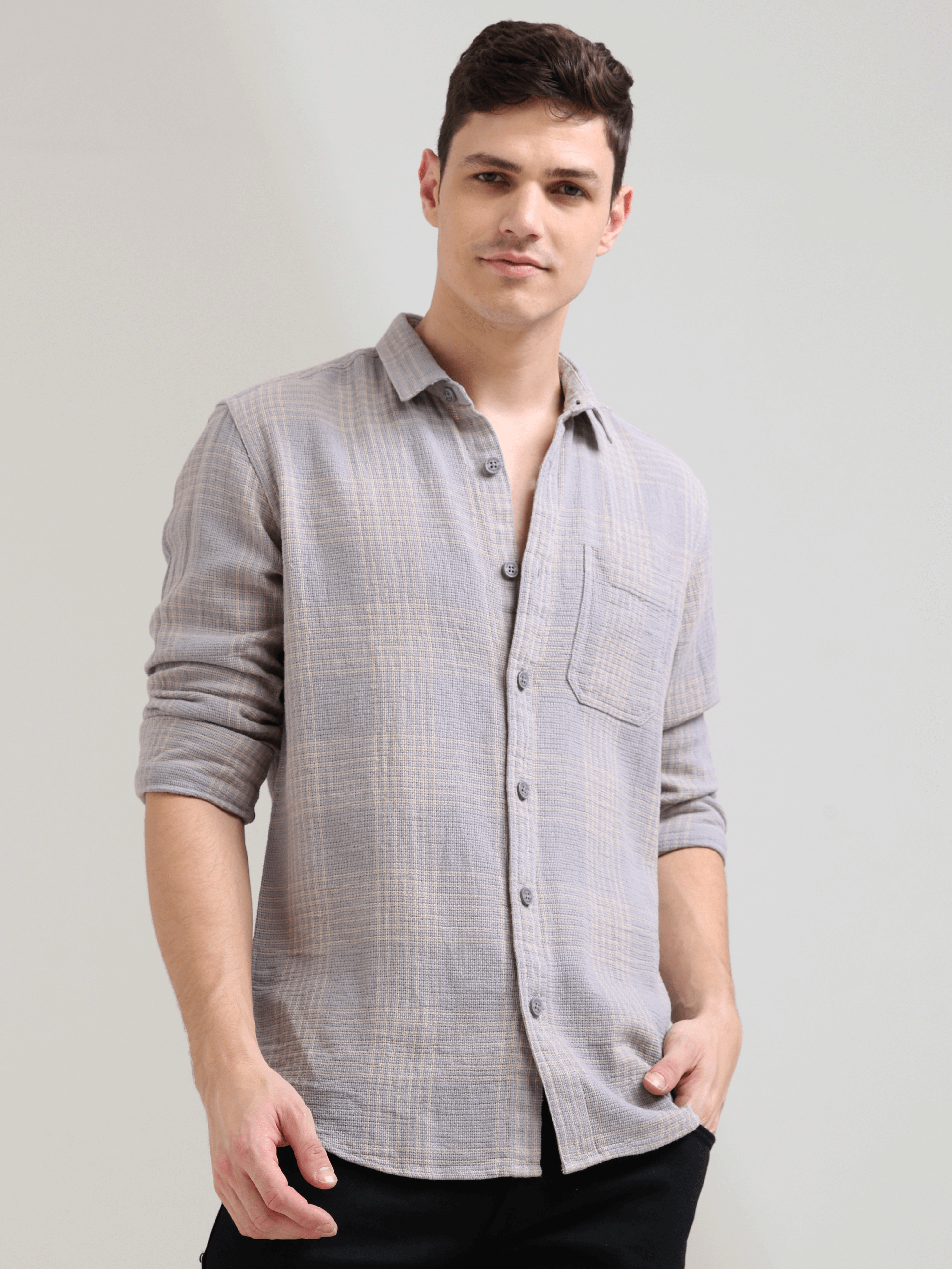 New age off-cream casual check shirt shop online at Estilocus. 100% Cotton • Full-sleeve check shirt• Cut and sew placket• Regular collar• Double button edge cuff• Single pocket • Curved bottom hemline .• All double needle construction, finest quality sew