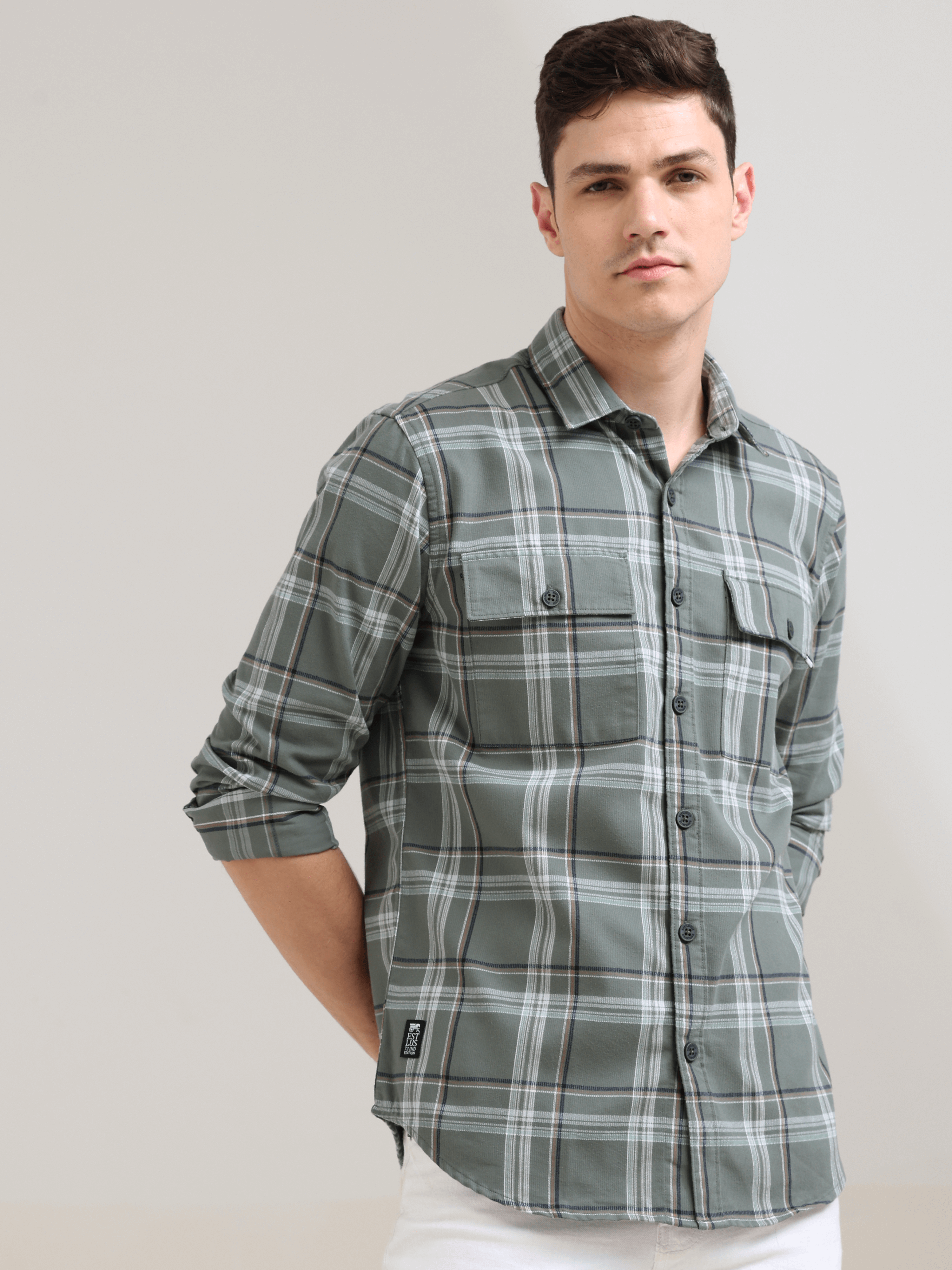 Taupe green off-white casual check shirt shop online at Estilocus. 100% Cotton • Full-sleeve check shirt• Cut and sew placket• Regular collar• Double button edge cuff• Double pocket with flap• Curved bottom hemline .• All double needle construction, fines