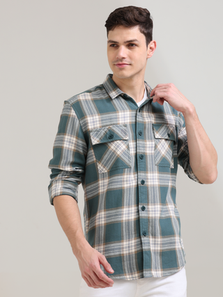 Aegean teal off-white casual check shirt shop online at Estilocus. 100% Cotton • Full-sleeve check shirt• Cut and sew placket• Regular collar• Double button edge cuff• Double pocket with flap• Curved bottom hemline .• All double needle construction, fines