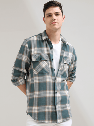 Aegean teal off-white casual check shirt shop online at Estilocus. 100% Cotton • Full-sleeve check shirt• Cut and sew placket• Regular collar• Double button edge cuff• Double pocket with flap• Curved bottom hemline .• All double needle construction, fines