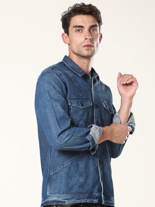 Man wearing a blue denim jacket on a white background.