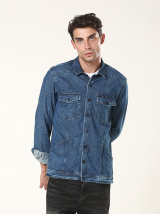 Man wearing a blue denim jacket on a white background