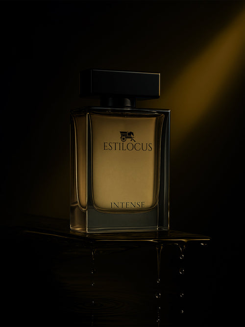 Perfume bottle labeled 'Estilocus Intense' on a dark background