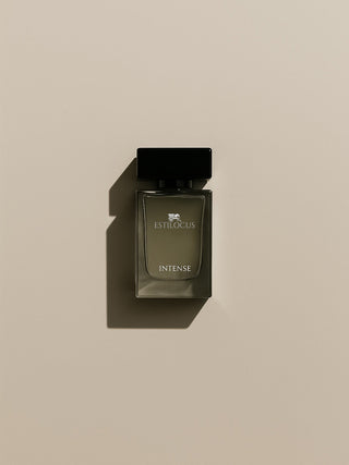 perfume bottle labeled 'Intense' by Estilocus on a beige background