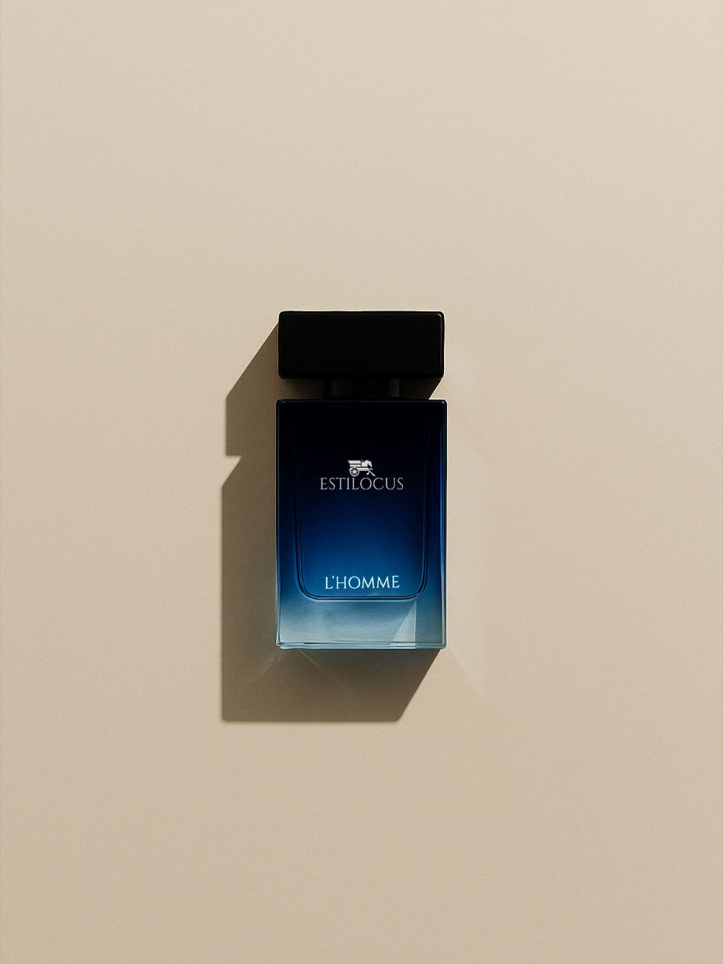 Estilocus L'Homme perfume bottle on a beige background
