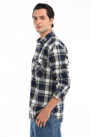 Man wearing a plaid shirt on a white background.